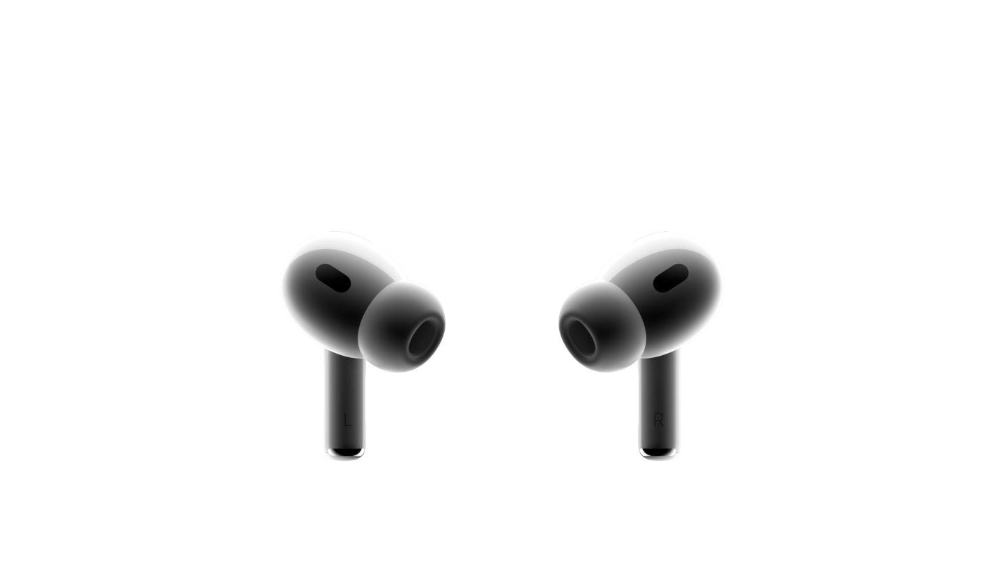 Deux écouteurs AirPods Pro blancs se faisant face. Embouts en silicone fixés aux écouteurs compacts avec tissu mesh noir sur chacun d’eux.