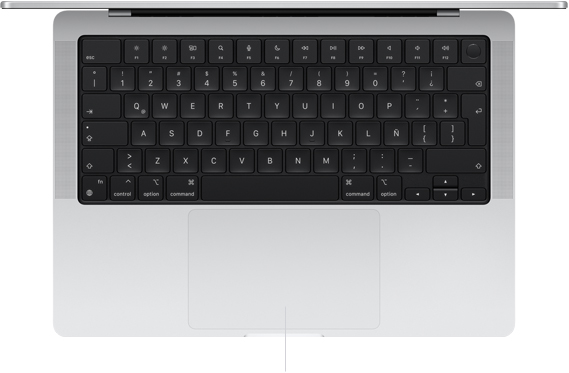 Vista desde arriba de una MacBook Pro de 14 pulgadas que muestra el trackpad Force Touch debajo del teclado
