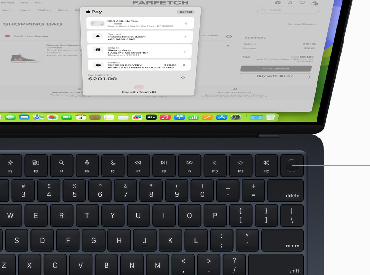 Top view of MacBook Air showcasing Touch ID and Magic Keyboard working with Apple Pay.