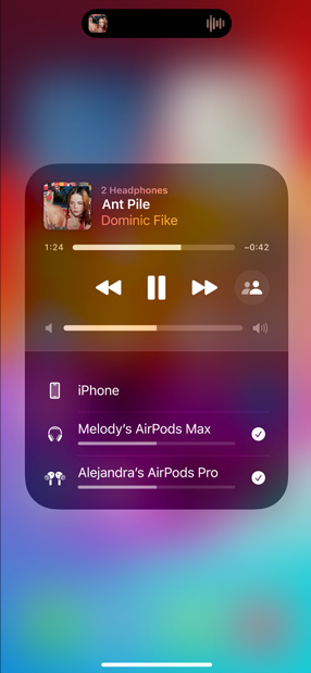 Layar iPhone menampilkan dua pasang AirPods mendengarkan 'All for Nothing (I'm So in Love)' dari Lauv.