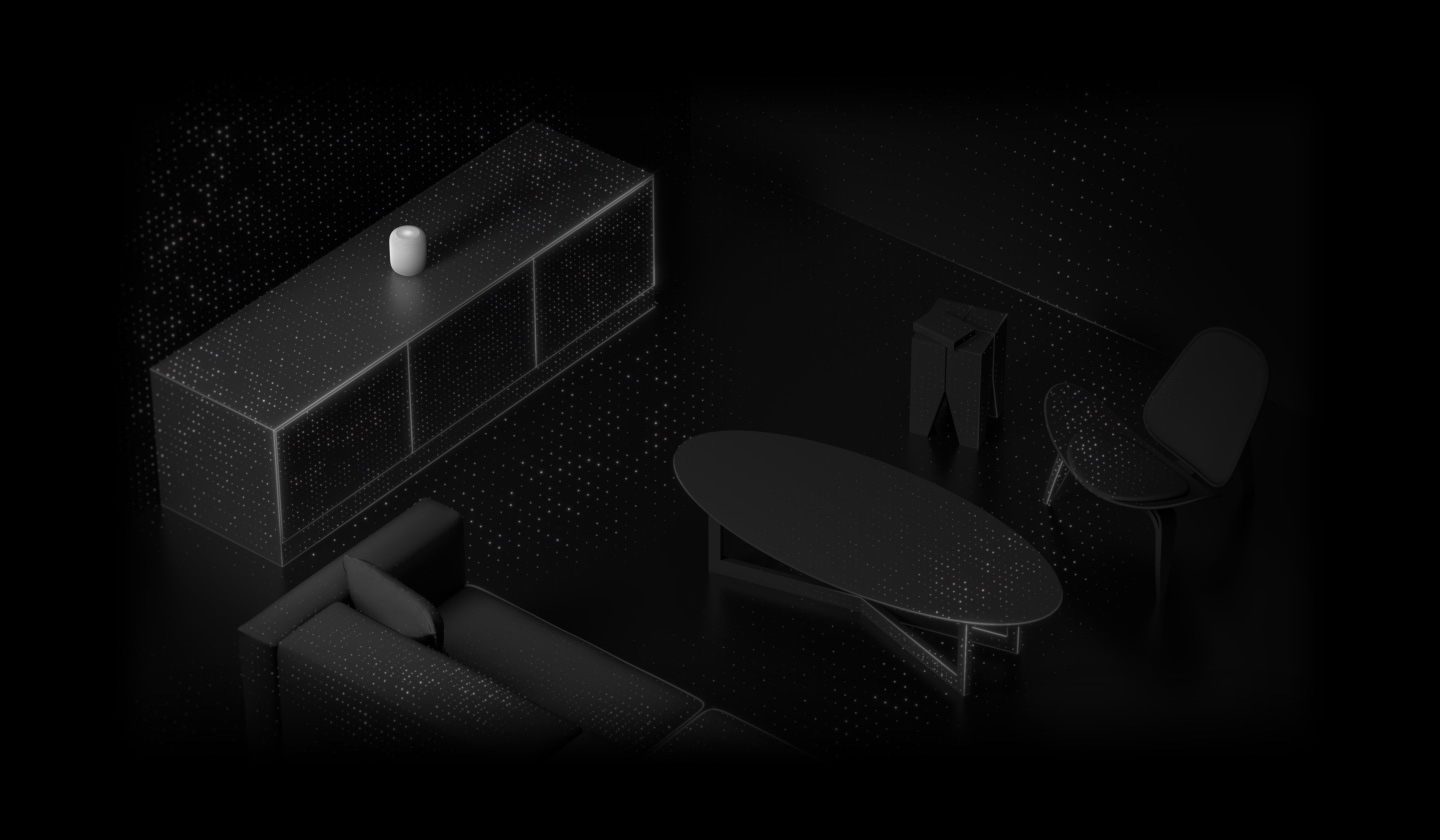 Une animation illustre le fonctionnement de l’analyse de l’espace. Un HomePod est placé sur une commode dans une pièce. Le son qui en émane est représenté sous la forme de particules lumineuses qui tracent les contours d’un sofa, d’une table basse, d’une table d’appoint et d’une chaise en se propageant à travers la pièce.