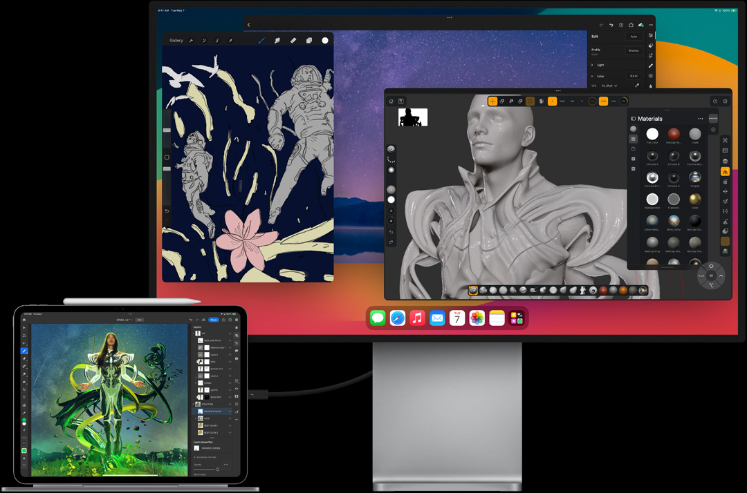 橫向放置的 iPad Pro 貼合上精妙鍵盤,連接至一個外置顯示器,顯示影像分別在兩個螢幕上編輯。
