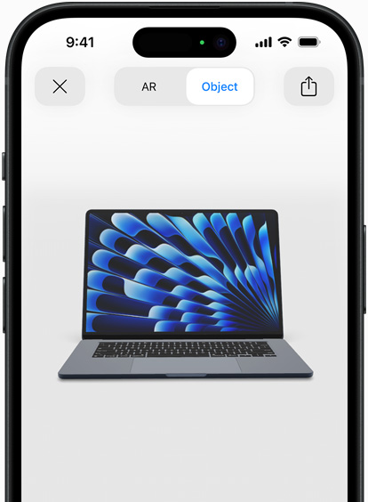 Preview of MacBook Air in Midnight colour being viewed in AR experience on iPhone