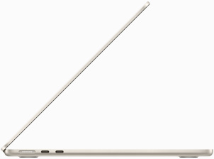 Vista lateral de un MacBook Air en blanco estrella