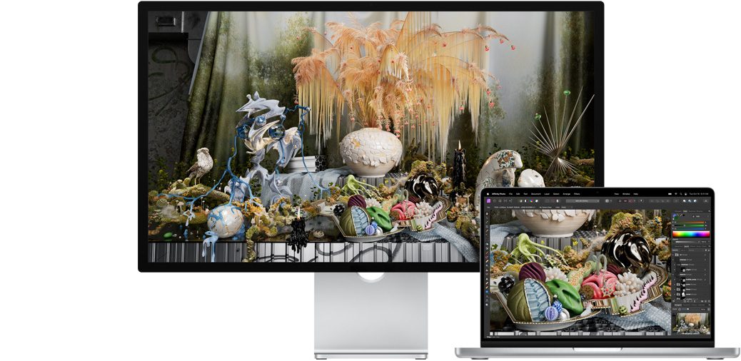 MacBook Pro 14 tum och Studio Display som visar ett projekt i Affinity Photo.