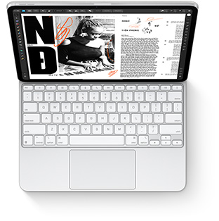 Top down view of iPad Pro with Magic Keyboard for iPad Pro in white.