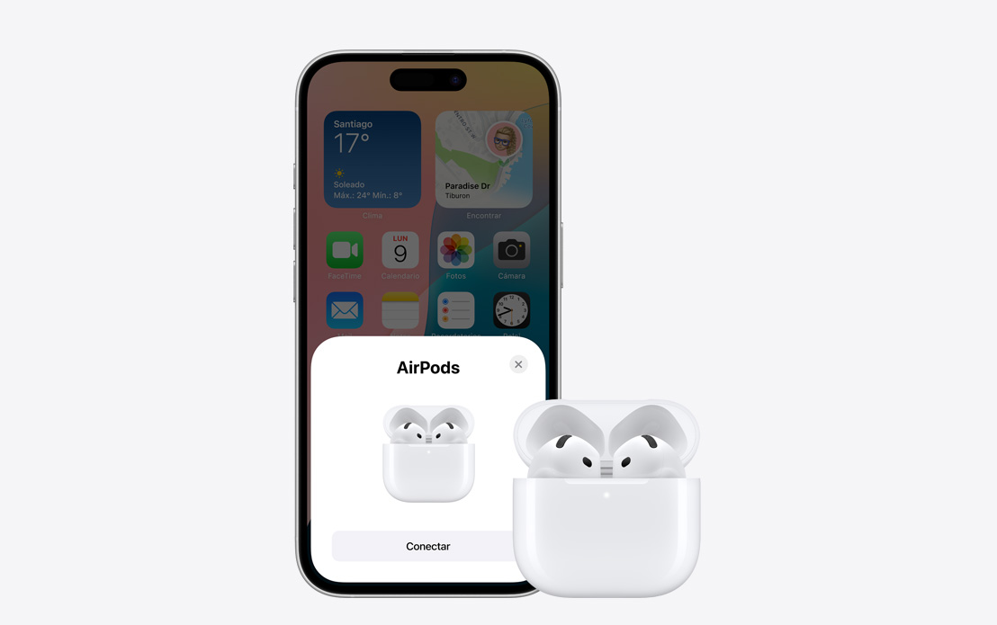 Unos AirPods al lado de un iPhone que muestra en la pantalla que están conectados.