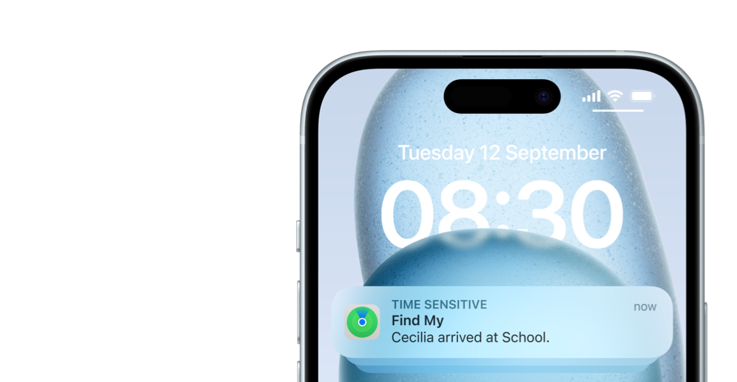 iPhone screen displaying a Find My notification: ‘Cecilia arrived at school’.