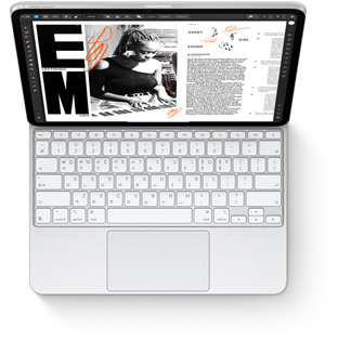 iPad Pro를 부착한 화이트 색상 iPad Pro용 Magic Keyboard를 위에서 내려다본 모습.