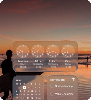 Liquid Glass Clock, Calendar, Reminders, and Weather widgets on macOS Tahoe screen over a scene of a surfer walking on the beach at sunset