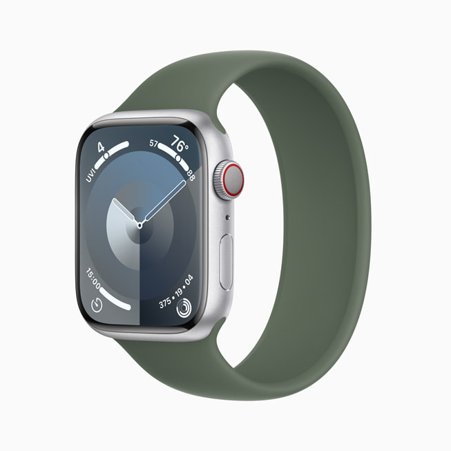 Apple Watch Series 9 in silver aluminum with an olive Solo Loop.