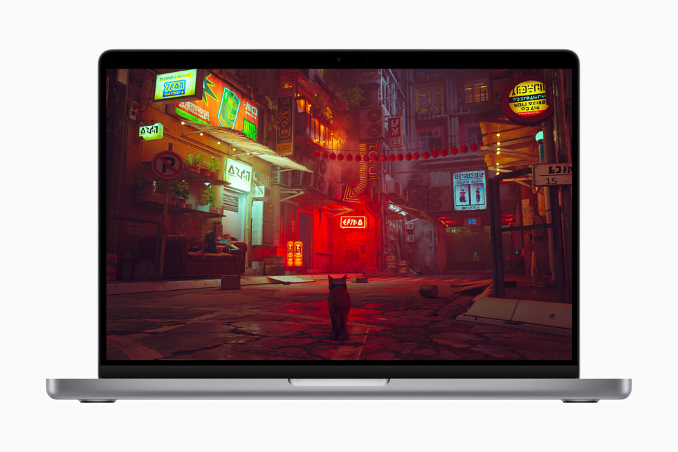 MacBook Pro menampilkan layar dari game video Stray.