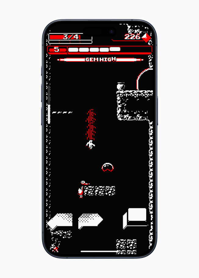 Downwell+ 게임 플레이 화면을 보여주는 iPhone 15 Pro.