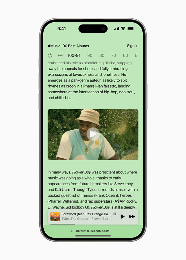 iPhone 15 Pro zobrazuje obrazovku se zajímavostmi o albu „Flower Boy“, na mikrostránce 100 nejlepších