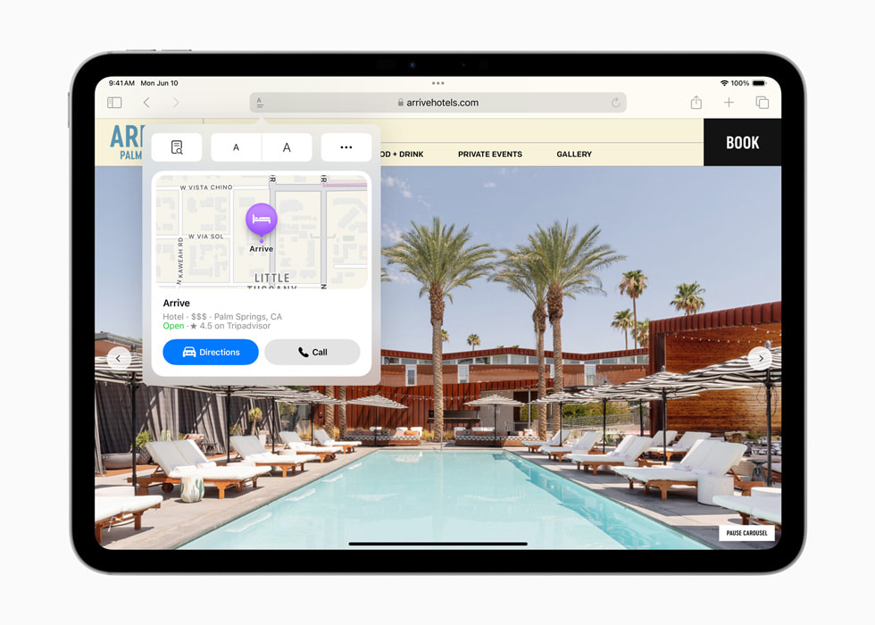 지도상 호텔의 위치가 담긴 상자와 함께 호텔 웹사이트를 보여주는 iPad Pro.