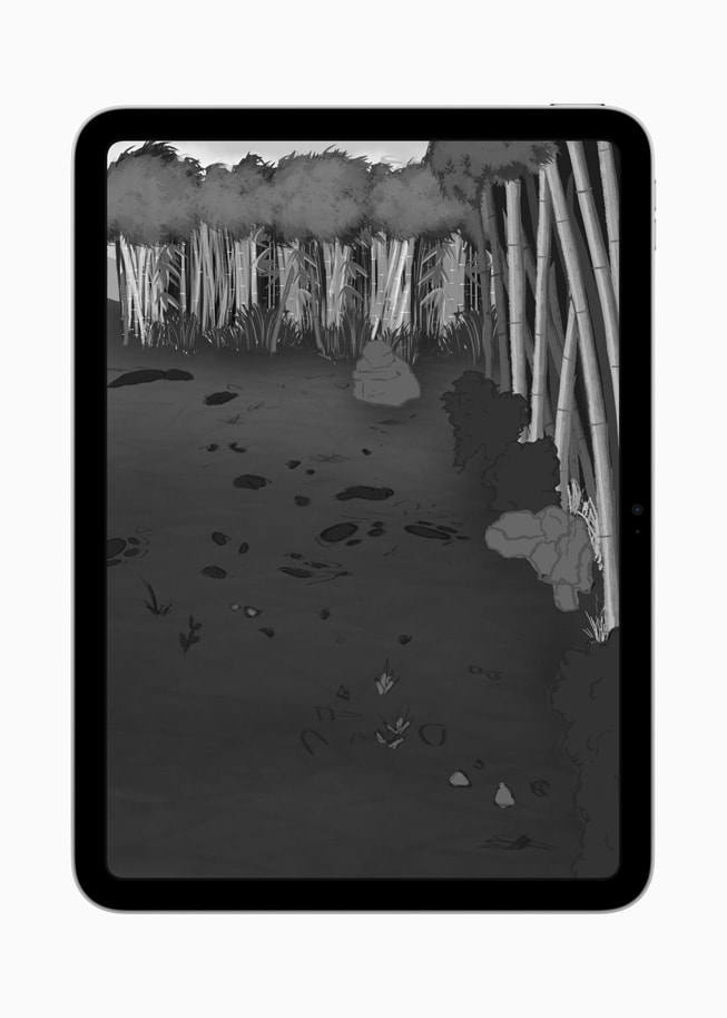 Ekran iPada z cyfrowym rysunkiem autorstwa Matthew Rady. Czarno‑biała ilustracja przedstawiająca łąkę, którą otacza niewielki las wysokich drzew.
