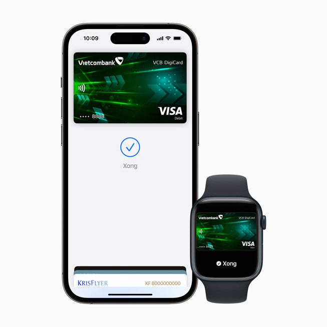 iPhone 14 Pro và Apple Watch Series 8 hiển thị một giao dịch Apple Pay với thẻ Visa.