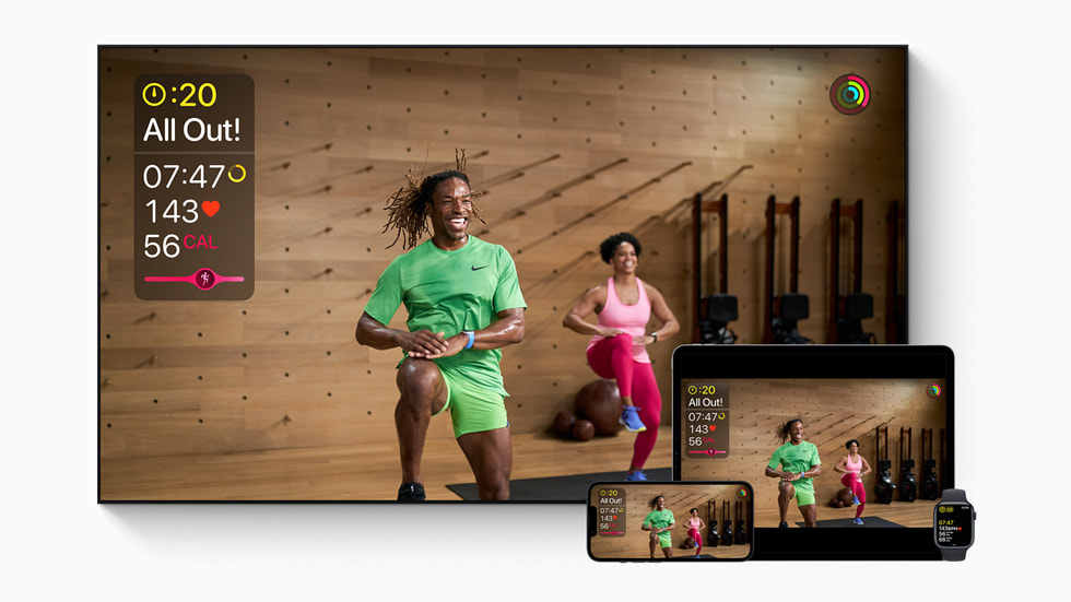 An Apple Fitness+ workout is shown on Apple TV, iPhone, iPad, and Apple Watch.