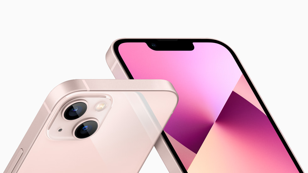 The TrueDepth camera system and the redesigned rear camera layout of iPhone 13 in pink.