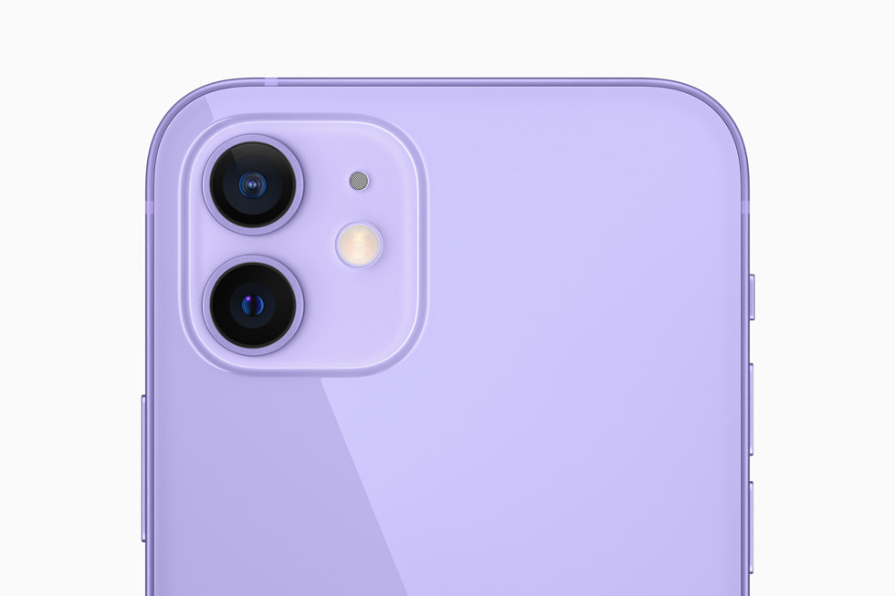 The dual-camera system on the purple iPhone 12.
