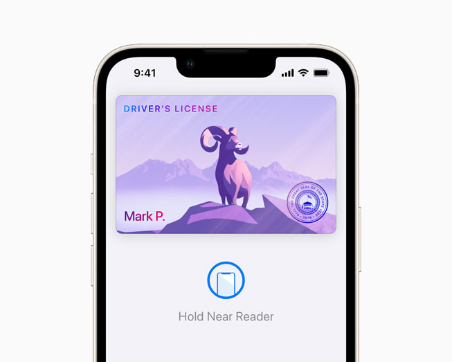 iOS 15 showing a driver’s license in Wallet on a starlight iPhone 13.