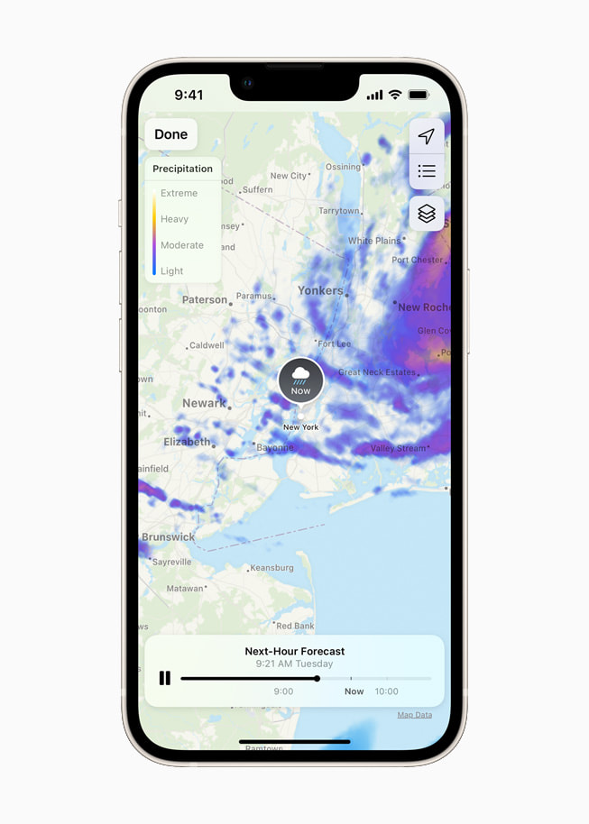 iOS 15’s redesigned Weather app showing a dynamic full-screen map on a starlight iPhone 13.