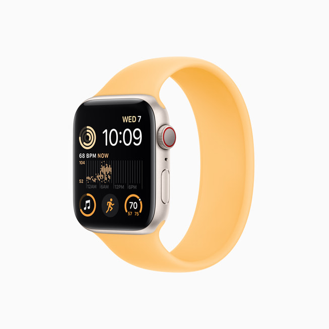 Apple Watch SE vỏ nhôm màu ánh sao với Dây Solo Loop màu nắng mai.