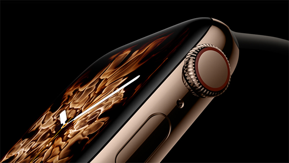 The gold stainless steel Apple Watch Series 4, displaying the new Fire watch face.