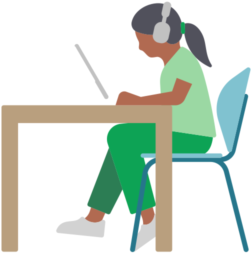 Woman wearing AirPods Max and using an iPad while sitting at a desk