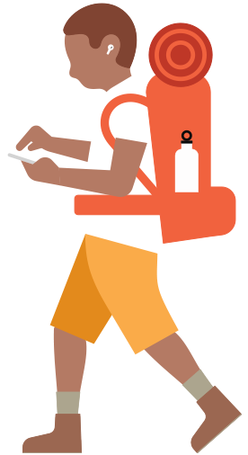 Person with hiking backpack wearing hearing aid and looking down at an iPhone in their hand