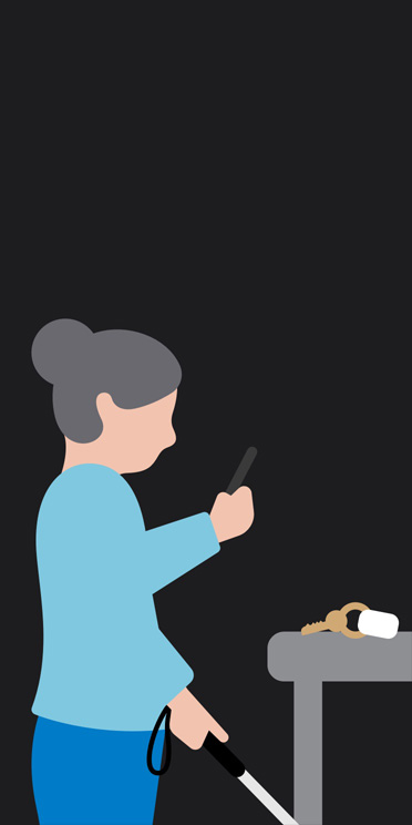 Ilustración de una mujer de perfil que está de pie, sostiene un bastón blanco, señala con un iPhone unas llaves sobre una mesa delante de ella