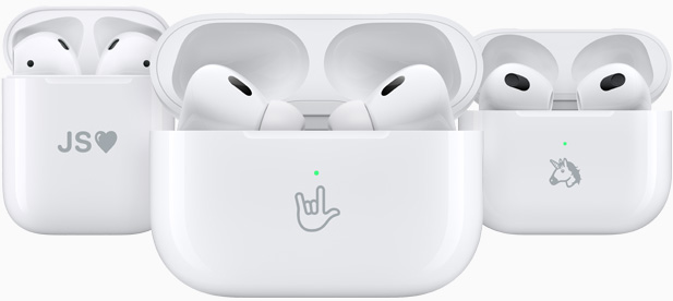 Three AirPods charging cases are engraved with example emojis: initials, an I-love-you hand sign and a unicorn.