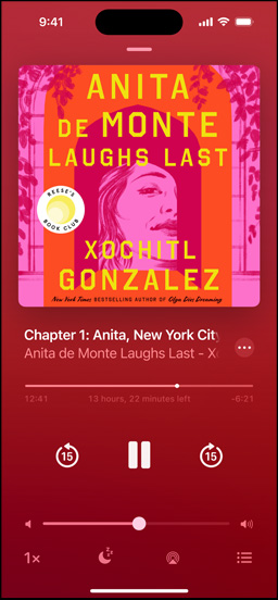 iPhone screen showing an audiobook. Below the cover art is playback controls, including a play button, volume slider, and jump ahead and jump back buttons