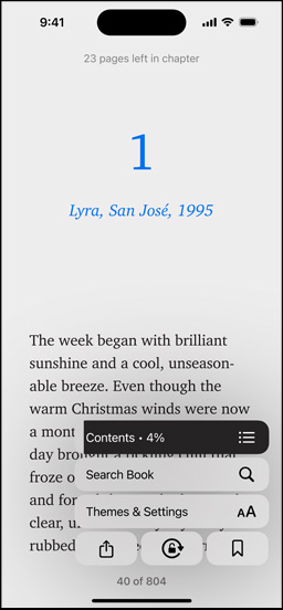 iPhone screen displaying a book page in the Books app. Overlaid on the book page, options for enlarging text, Search Book, and Themes & Settings on the screen are shown
