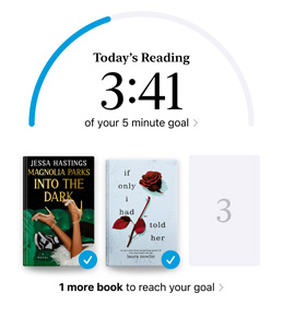iPhone screen showing the Reading Goals interface in the Books app. At the top, there is a progress ring for a reading goal. Below the progress ring are three book covers. Beneath the book covers is text that one more book is needed to reach the 2024 goal of reading eight books.