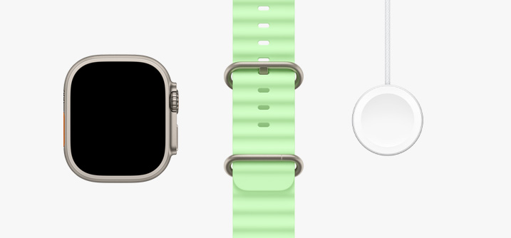 Apple Watch Ultra 3, титанов корпус в натурален цвят, дисплей от край до край, Ocean Band в неоново зелено, магнитен USB‑C кабел за бързо зареждане на Apple Watch