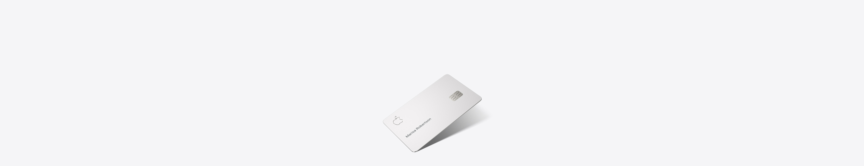 Apple Card, front, Apple logo in top left, cardholder name in middle left Marisa Robertson, card chip in middle right.