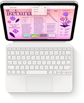 „iPad“ su balta „Magic Keyboard Folio“ – vaizdas iš viršaus.