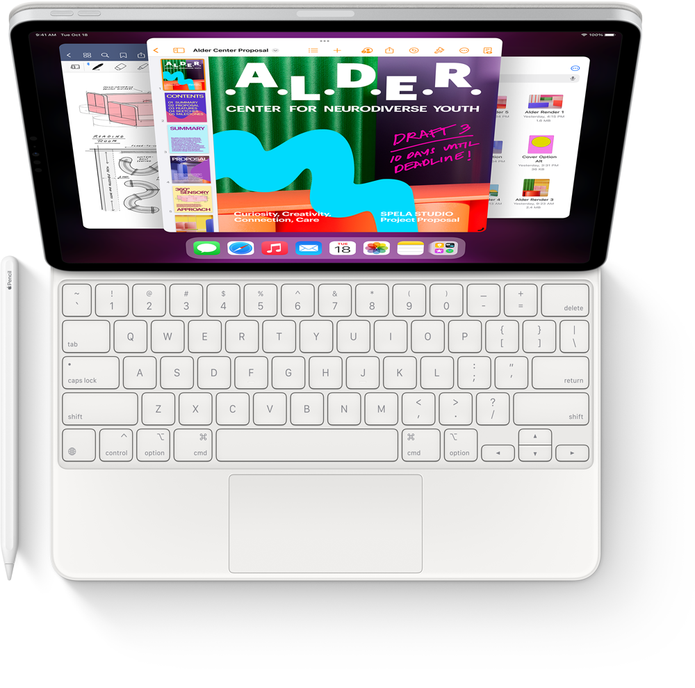 Widok z góry na iPada Pro z klawiaturą Magic Keyboard i rysikiem Apple Penencil, na którym widać aplikację Stage Manager z kilkoma otwartymi aplikacjami.