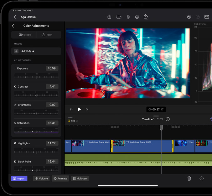 iPad Pro i horisontellt läge, användaren redigerar en video av en person som spelar trummor