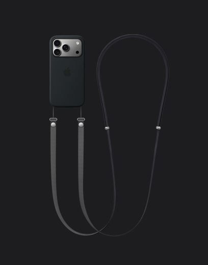 iPhone 17 Pro, ภายนอกด้านหลัง, สีเงิน, ใส่เคสซิลิโคนพร้อม MagSafe สีดำที่มีสายสะพายข้างสีเทาเข้มติดอยู่
