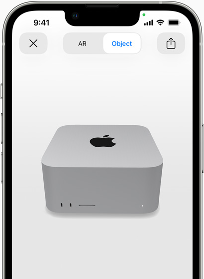 Un iPhone previsualizando una Mac Studio con realidad aumentada
