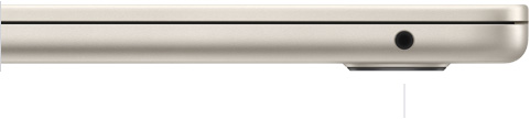 Imagen del lateral derecho de un MacBook Air cerrado que muestra la toma para auriculares