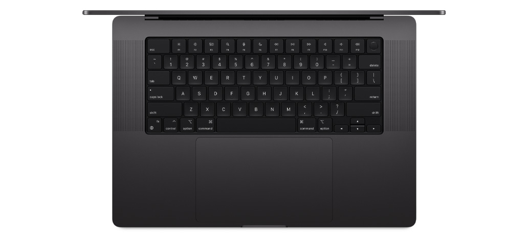 Vedere de sus a unui MacBook Pro prezentând Magic Keyboard cu Touch ID și trackpad încorporate