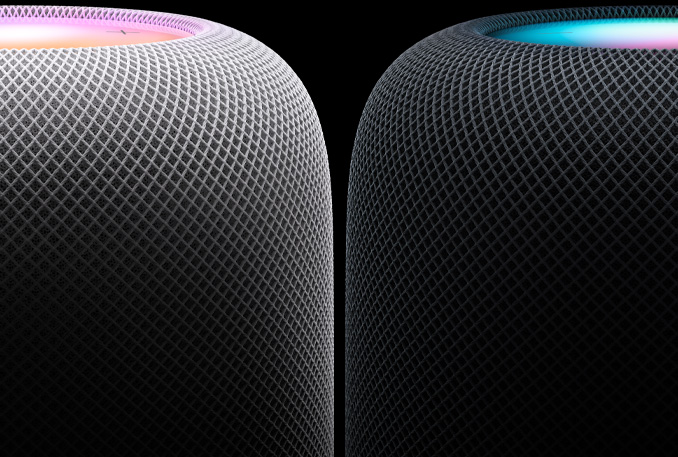 One White and one Midnight HomePod pictured side-by-side