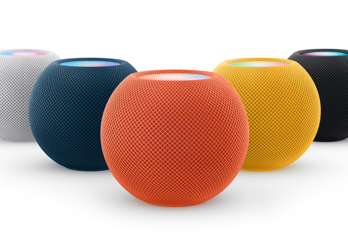 From left to right: one White, one Blue, one Orange, one Yellow, and one Midnight HomePod mini