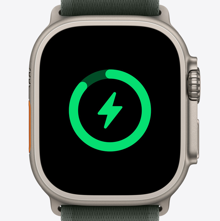 An Apple Watch Ultra 2 showing the battery charging icon.