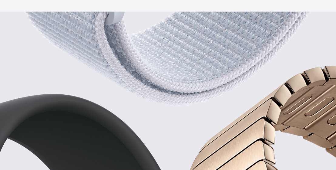 Three Apple Watch bands. A Blue Cloud Sport Loop. A Black Solo Loop. And a Gold Link Bracelet.